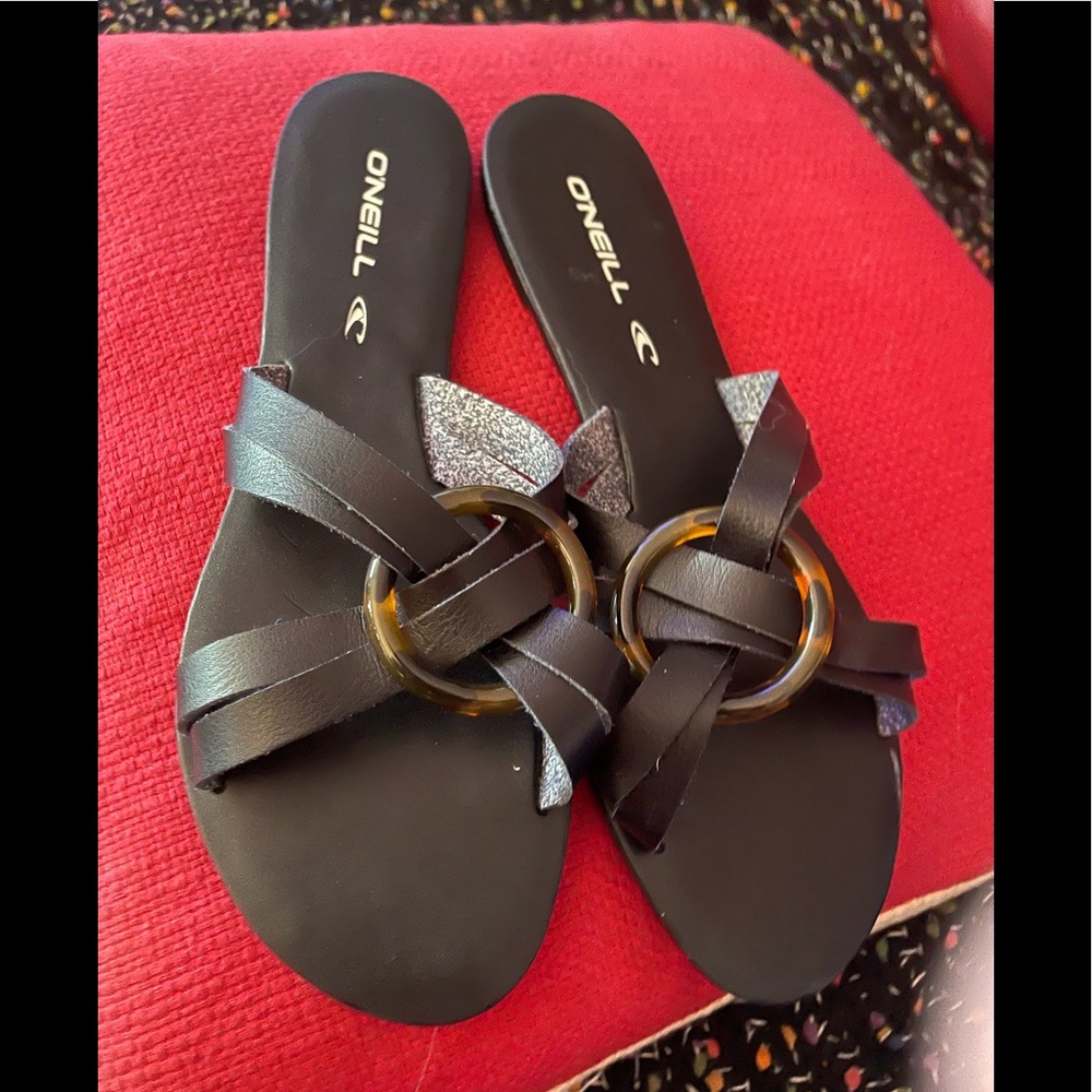 Brand new black O’NEIL slides  with tortoise shell accents.